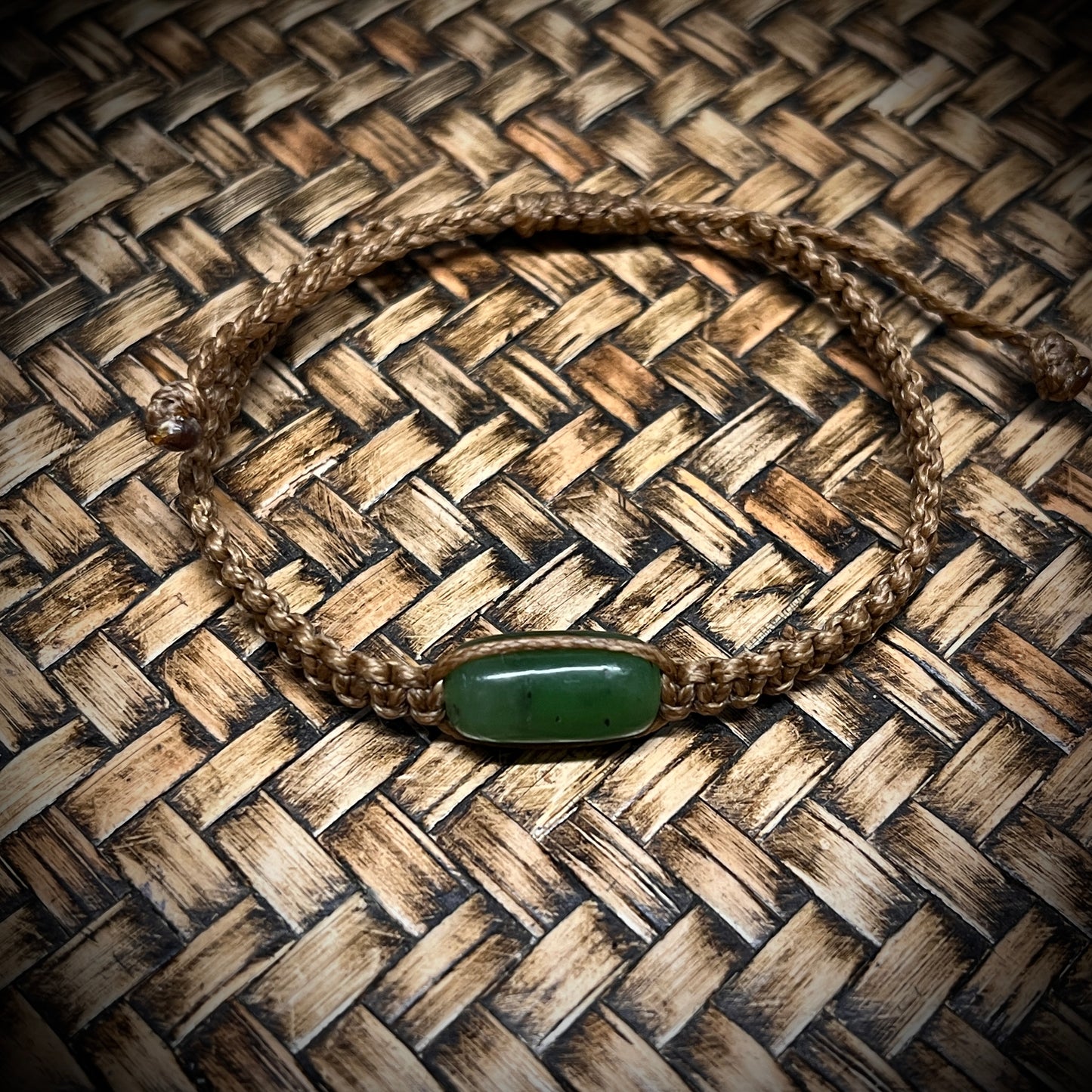 Pounamu pebble-stone bracelets (Kawakawa)