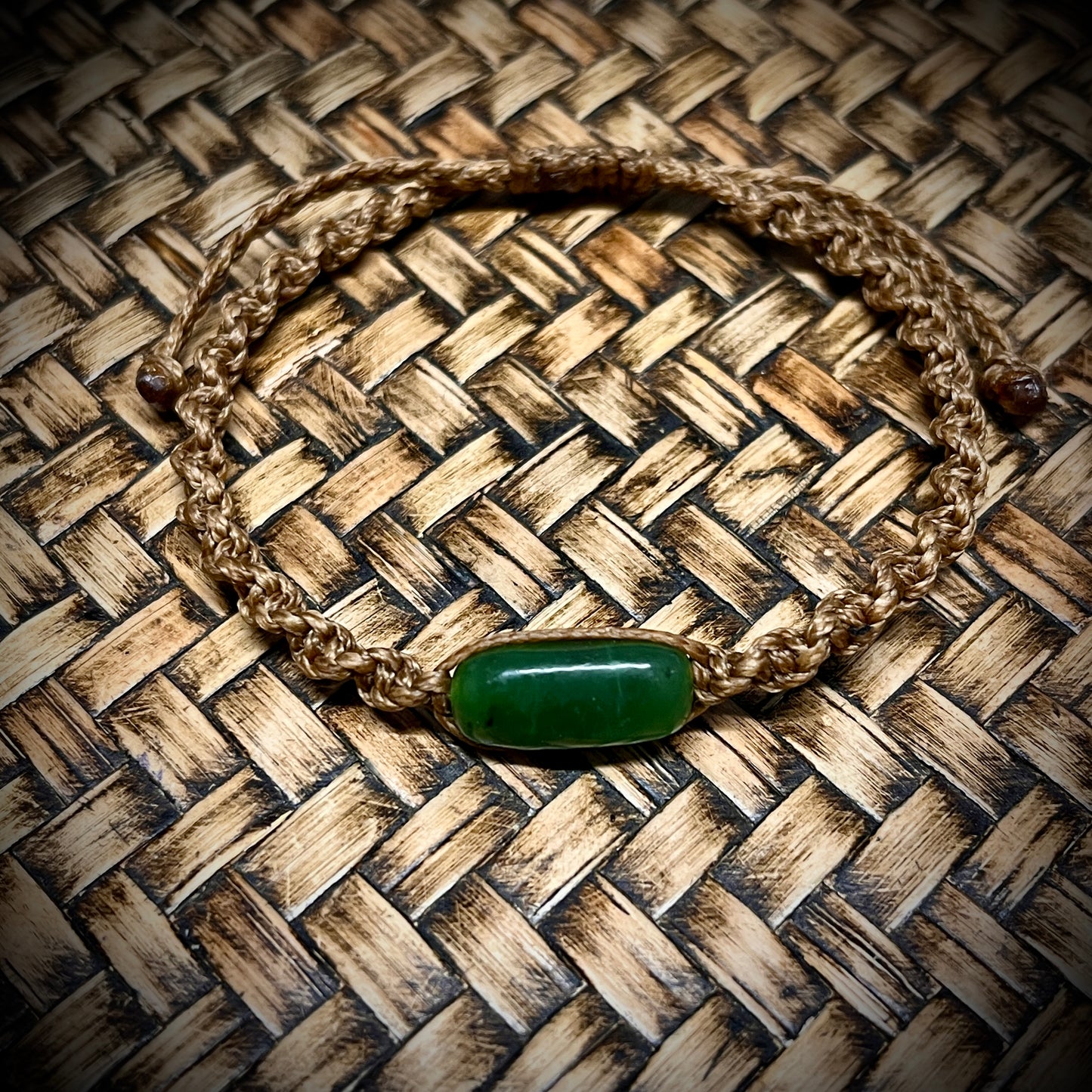 Pounamu pebble-stone bracelets (Kawakawa)