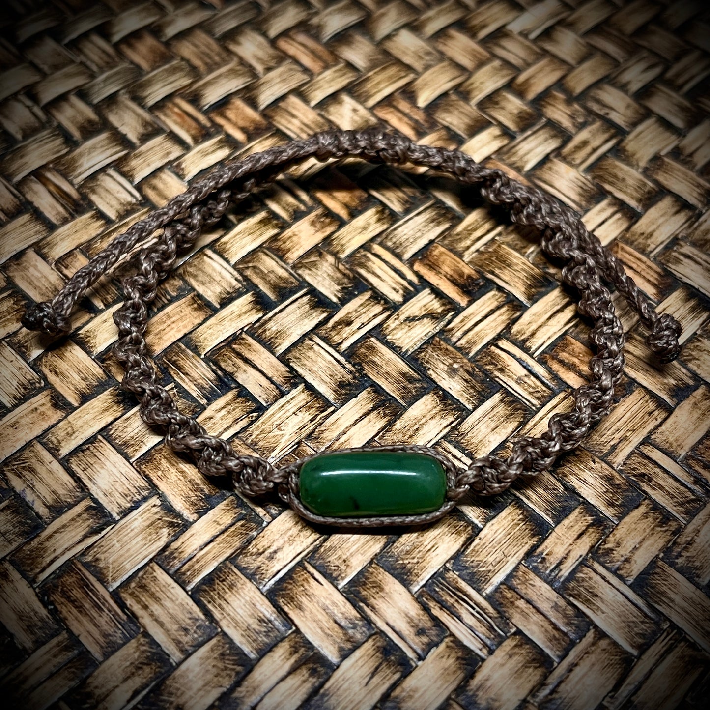 Pounamu pebble-stone bracelets (Kawakawa)