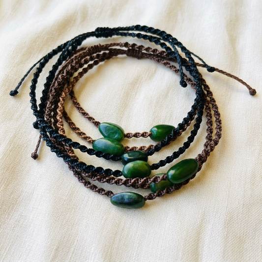 Dark anklets on creamy linen with cream anklets removed