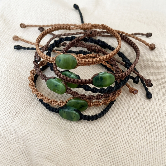 Greenstone bracelets on creamy linen
